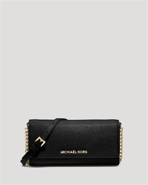 michael kors purse charm with black strap|michael kors crossbody wallet.